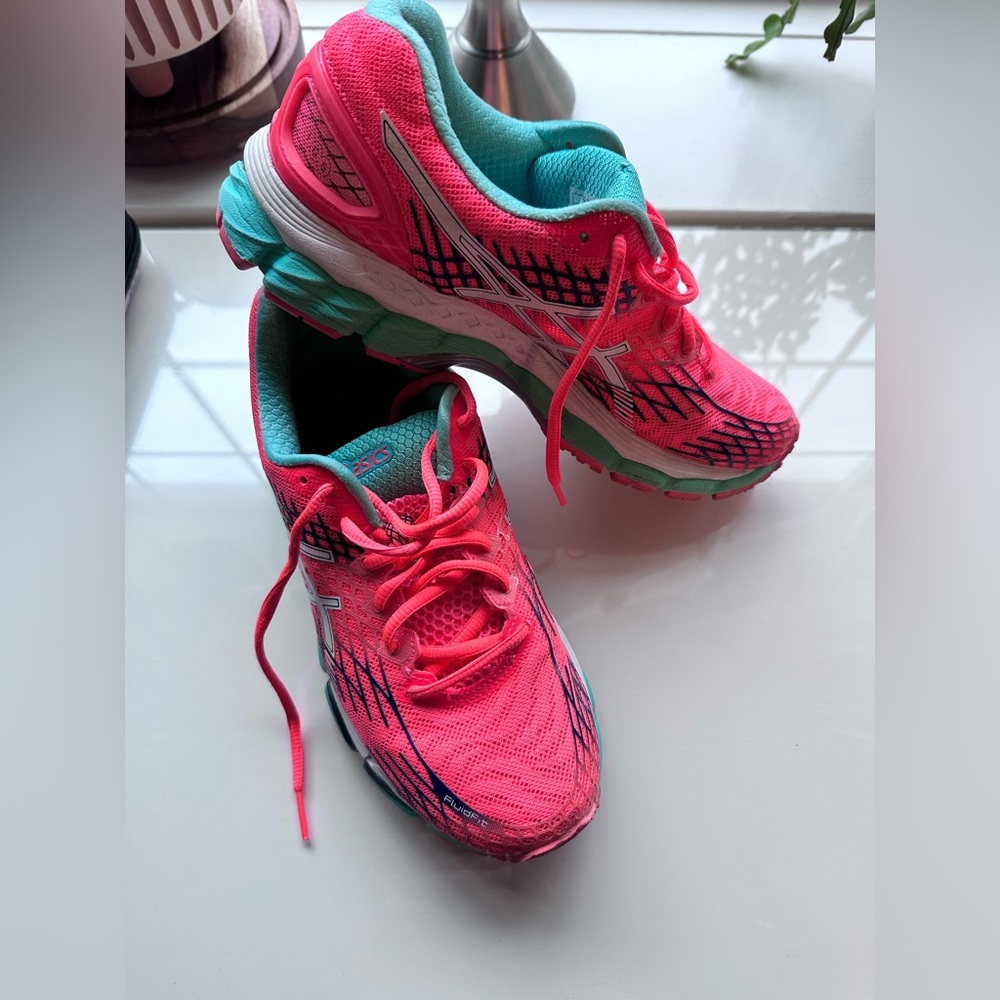 Asics- woman’s size 8- only used indoor gyms. Worn but still looking sharp.